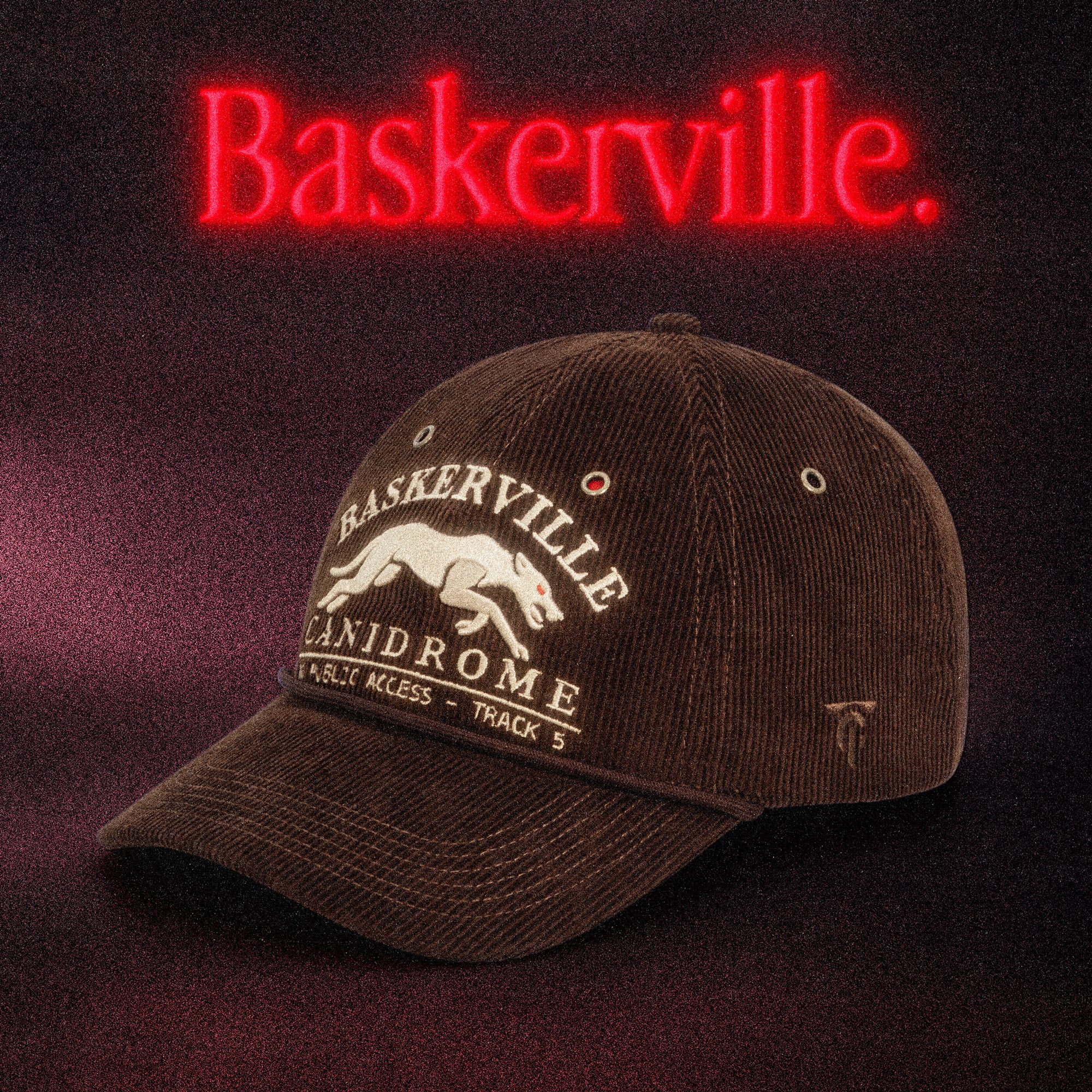Brown corduroy Baskerville Canidrome cap featuring embroidered greyhound artwork and vintage racing graphics