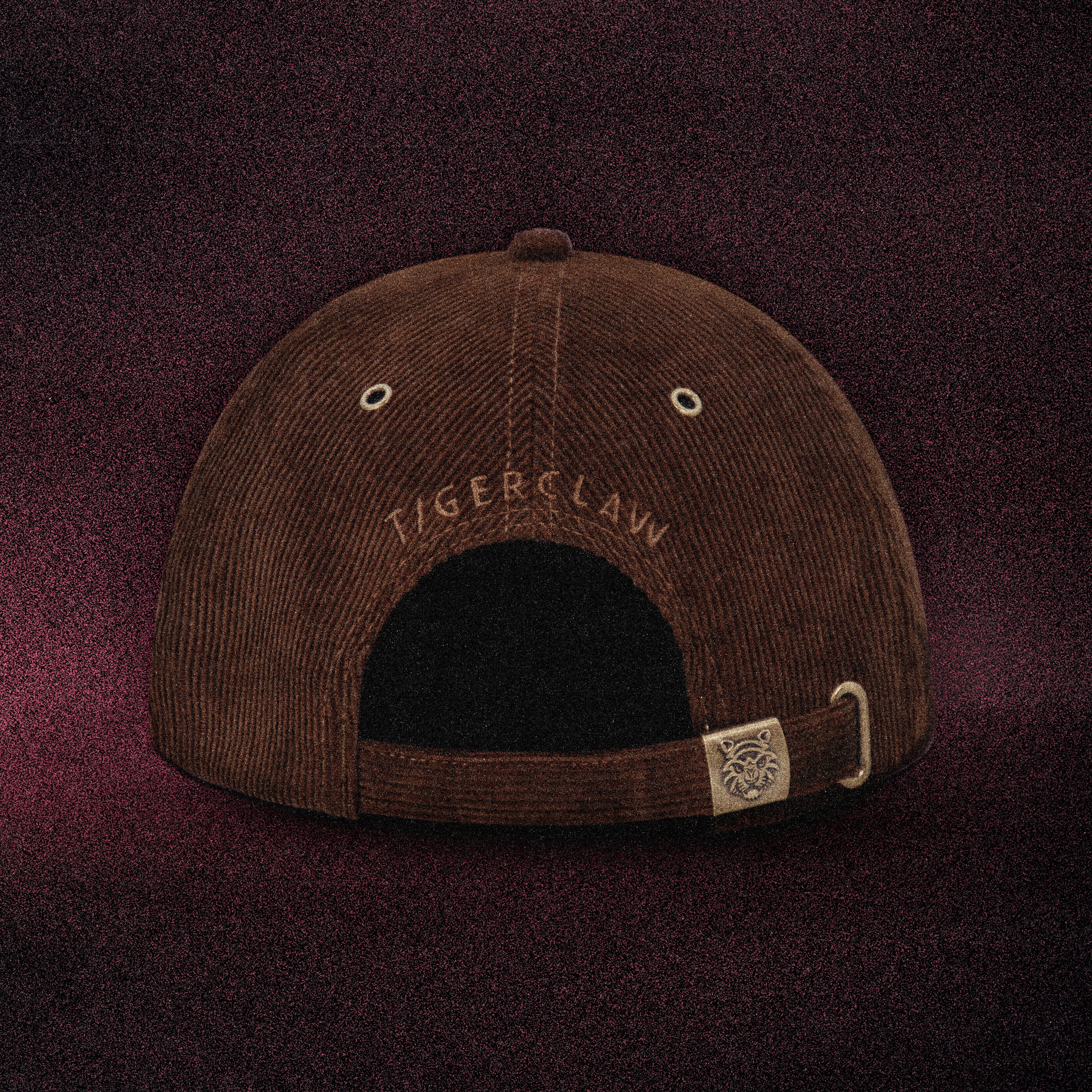 Back view of the Tigerclaw Baskerville Canidrome corduroy cap featuring tonal rear embroidery, adjustable strap closure and premium headwear construction