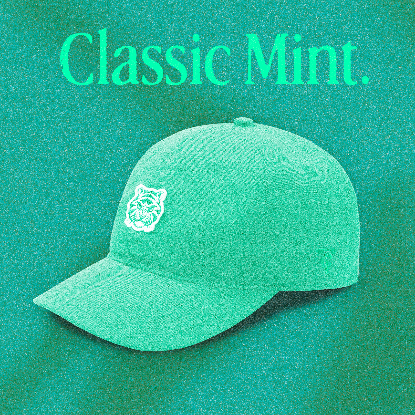 A mint green "Classic Mint" Tigerclaw strapback cap set against a textured mint-toned backdrop, with bold serif headline text above the cap and a clean front angle showcasing the white embroidered tiger logo.
