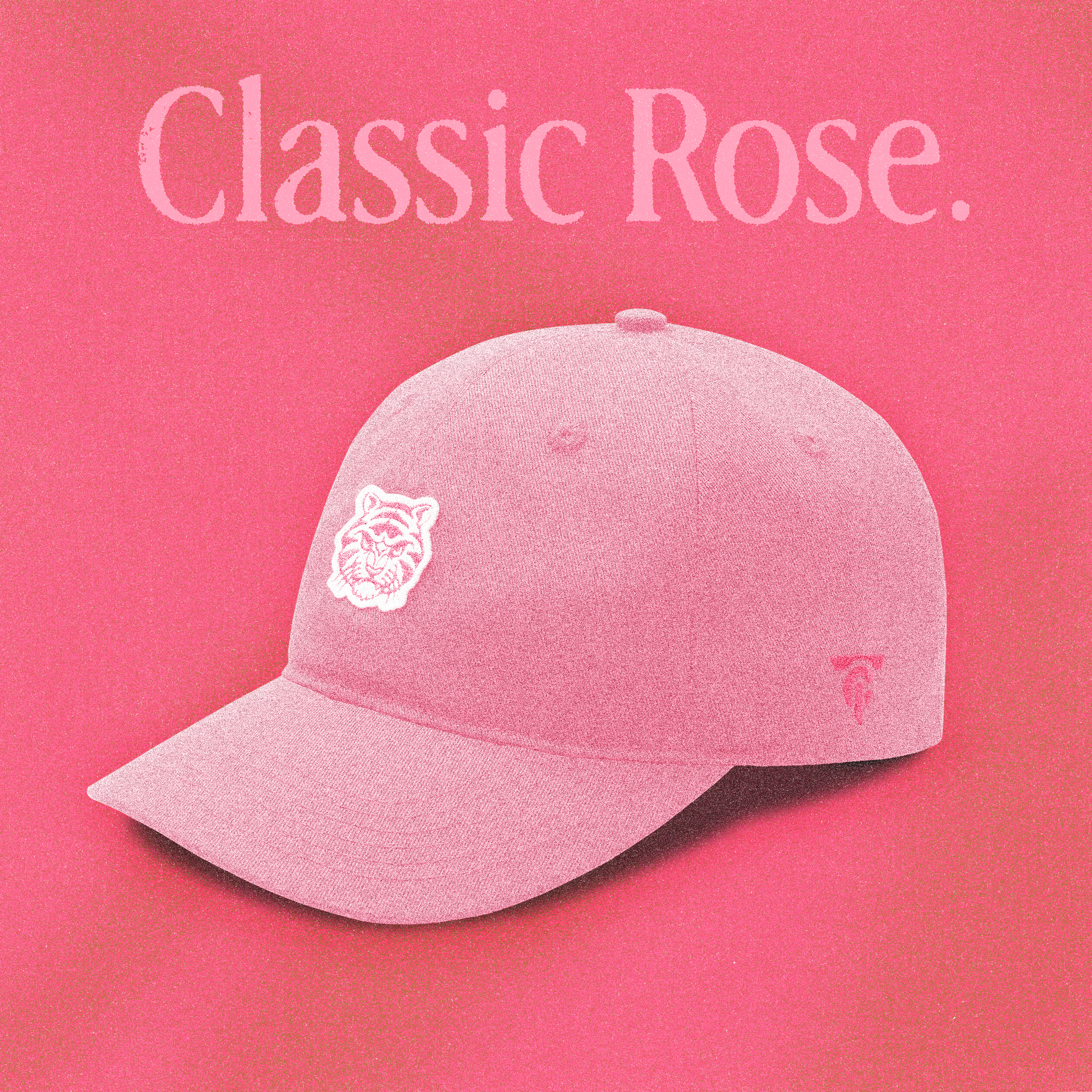 A soft pink "Classic Rose" Tigerclaw strapback cap positioned on a rose-colored gradient background, with serif “Classic Rose” text above and a white embroidered tiger logo on the front panel.