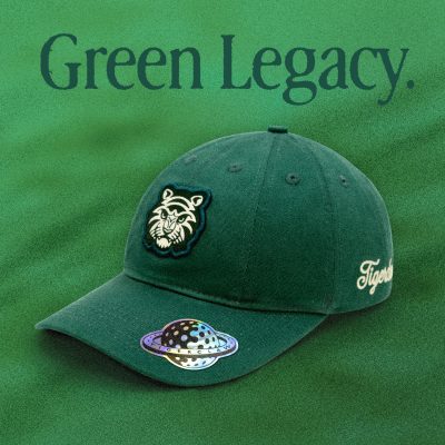Green Legacy 10-panel cap by Tigerclaw, shown in Sacramento green with front woven tiger patch and side embroidery.