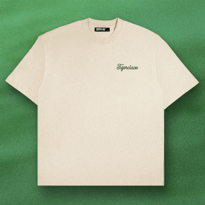 Flat lay of Tigerclaw Golf Club Tee showing front logo in green script
