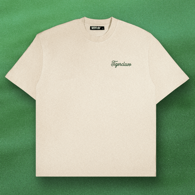 Flat lay of Tigerclaw Golf Club Tee showing front logo in green script