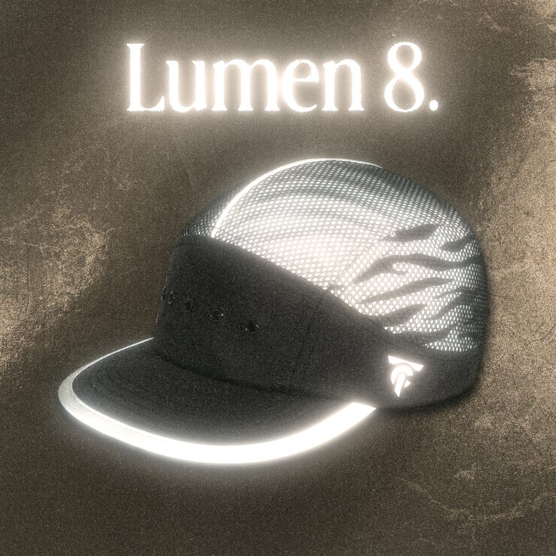 Reflective black 8-panel running cap “LUMEN8” by Tigerclaw, glowing under light.