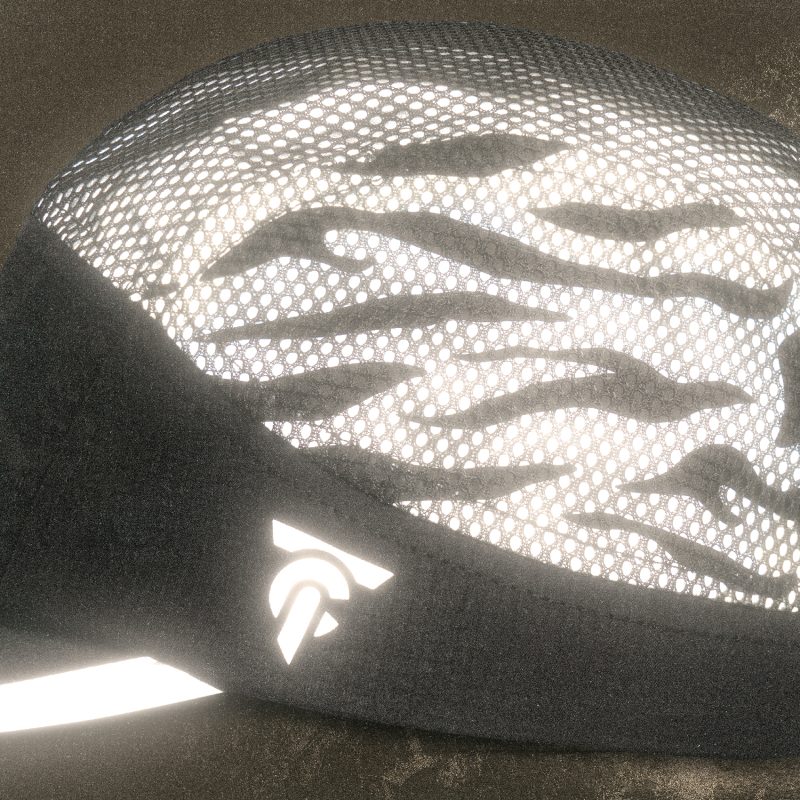 Close-up of the Tigerclaw LUMEN8 cap with reflective mesh glowing under light.